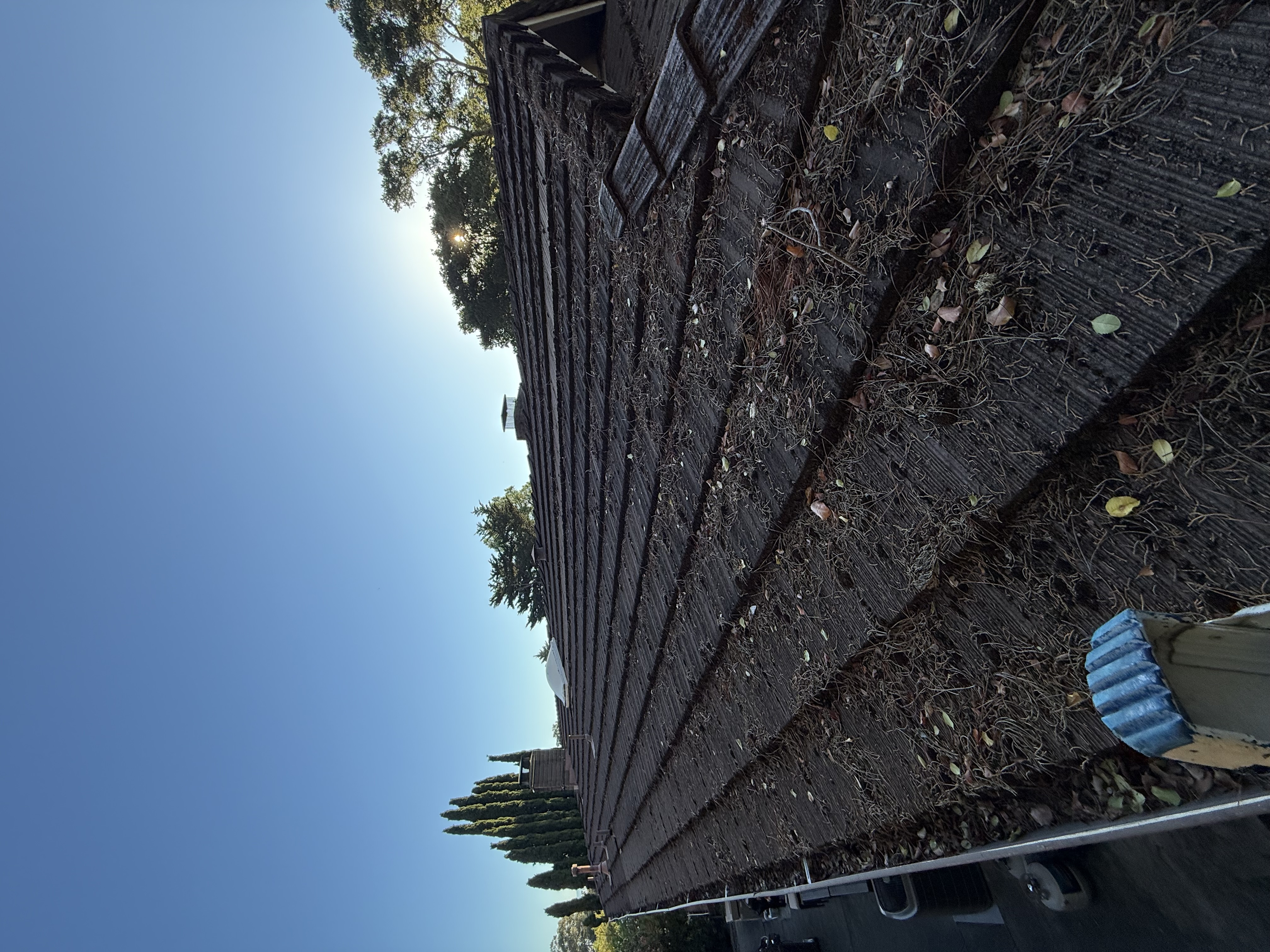 Before — Atherton roof with moss and lichen growth before washing