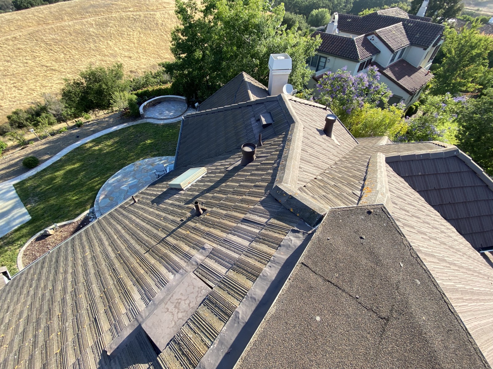 Before — Cupertino flat concrete tile roof with moss and lichen before soft wash