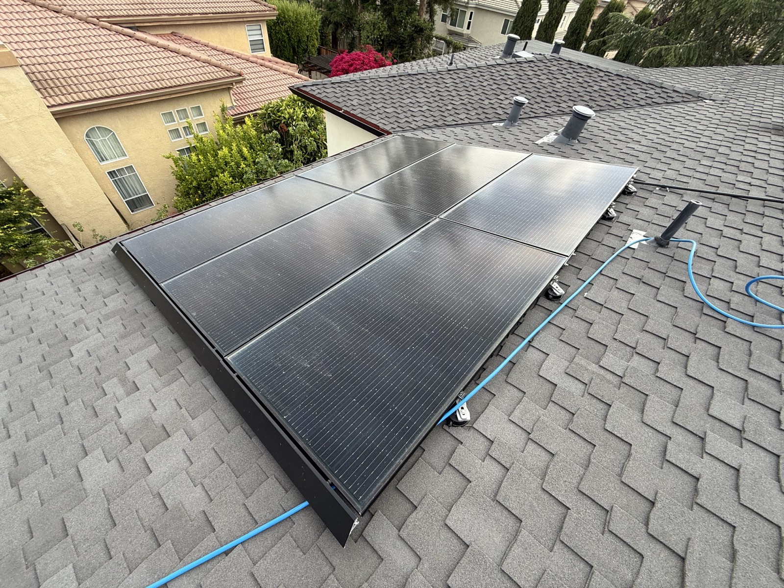 Before — Cupertino solar panel row with bird dropping stains before wash