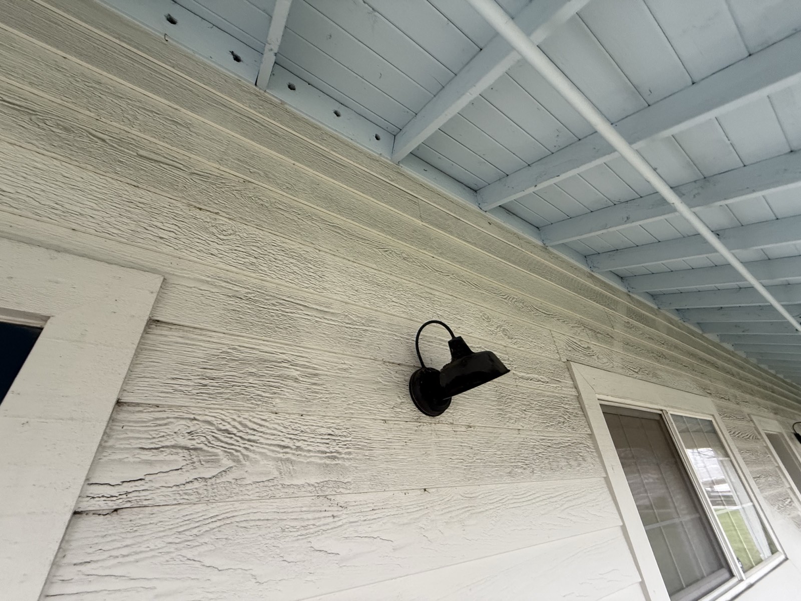 Before — Fremont metal roof panel faces with dark pollution film