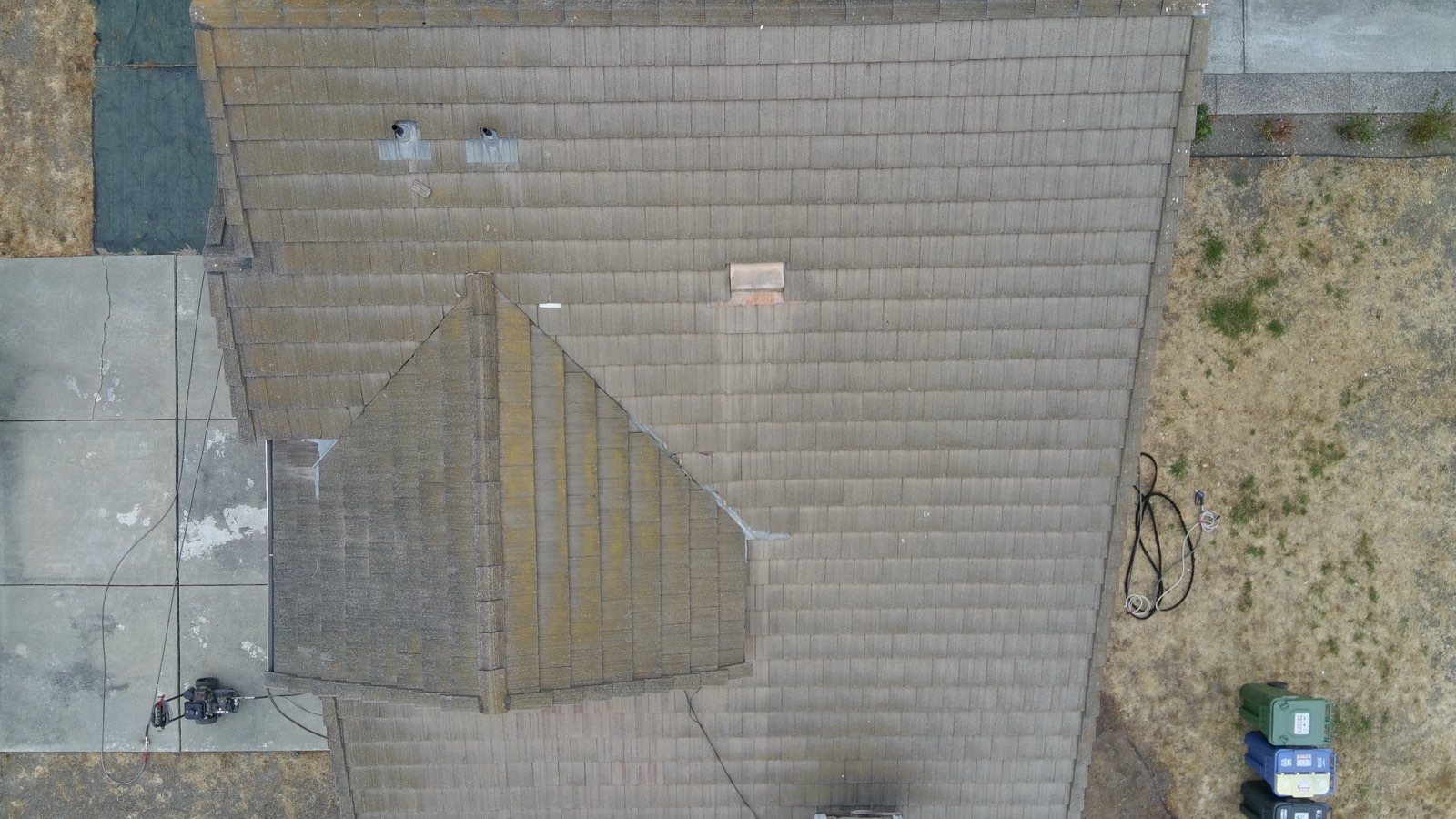Before — Fremont tile roof surface with moss accumulation in joints