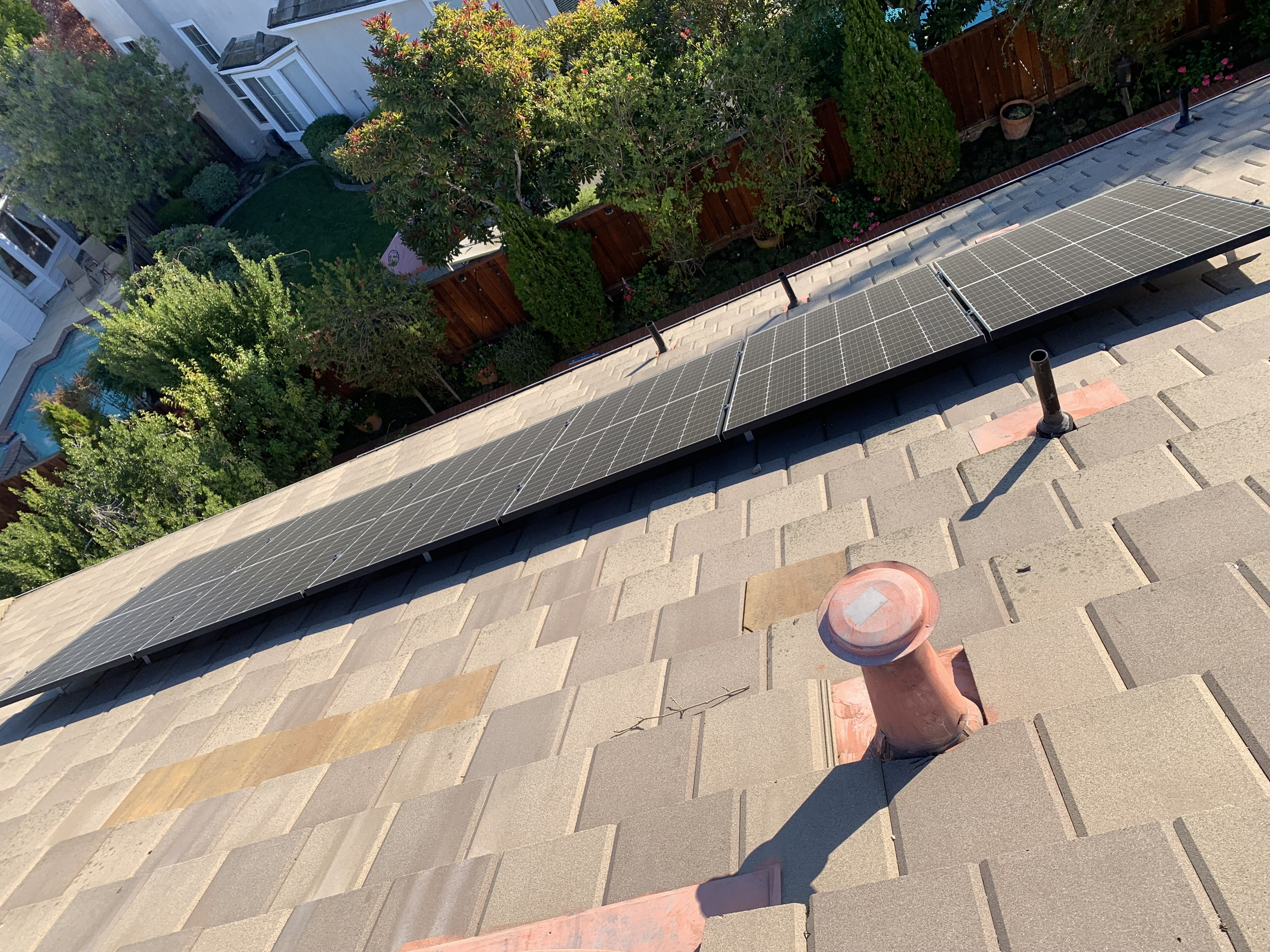 Before — Livermore solar array showing pollen and organic film buildup