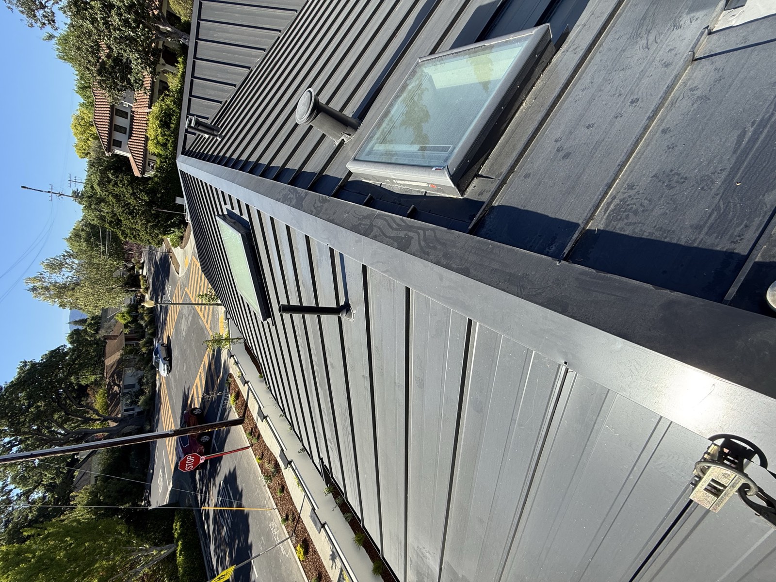 Before — Menlo Park roof with biological growth before soft wash