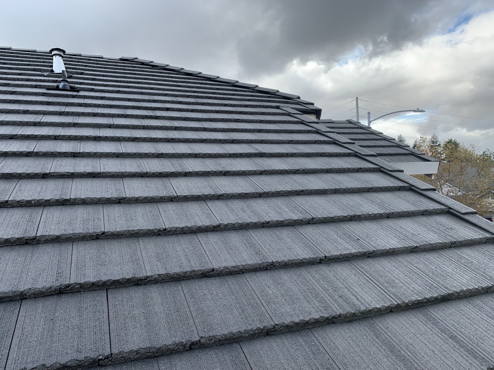 After — Milpitas flat concrete tile roof cleaned, algae removed