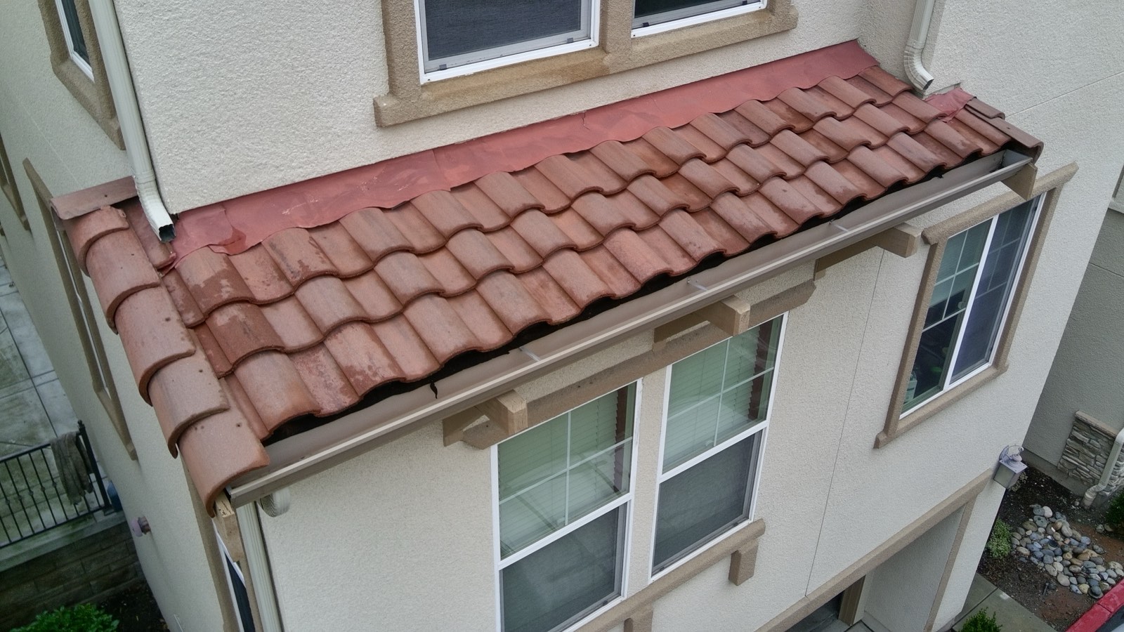 After — Milpitas concrete S-tile roof cleaned, algae and moss removed