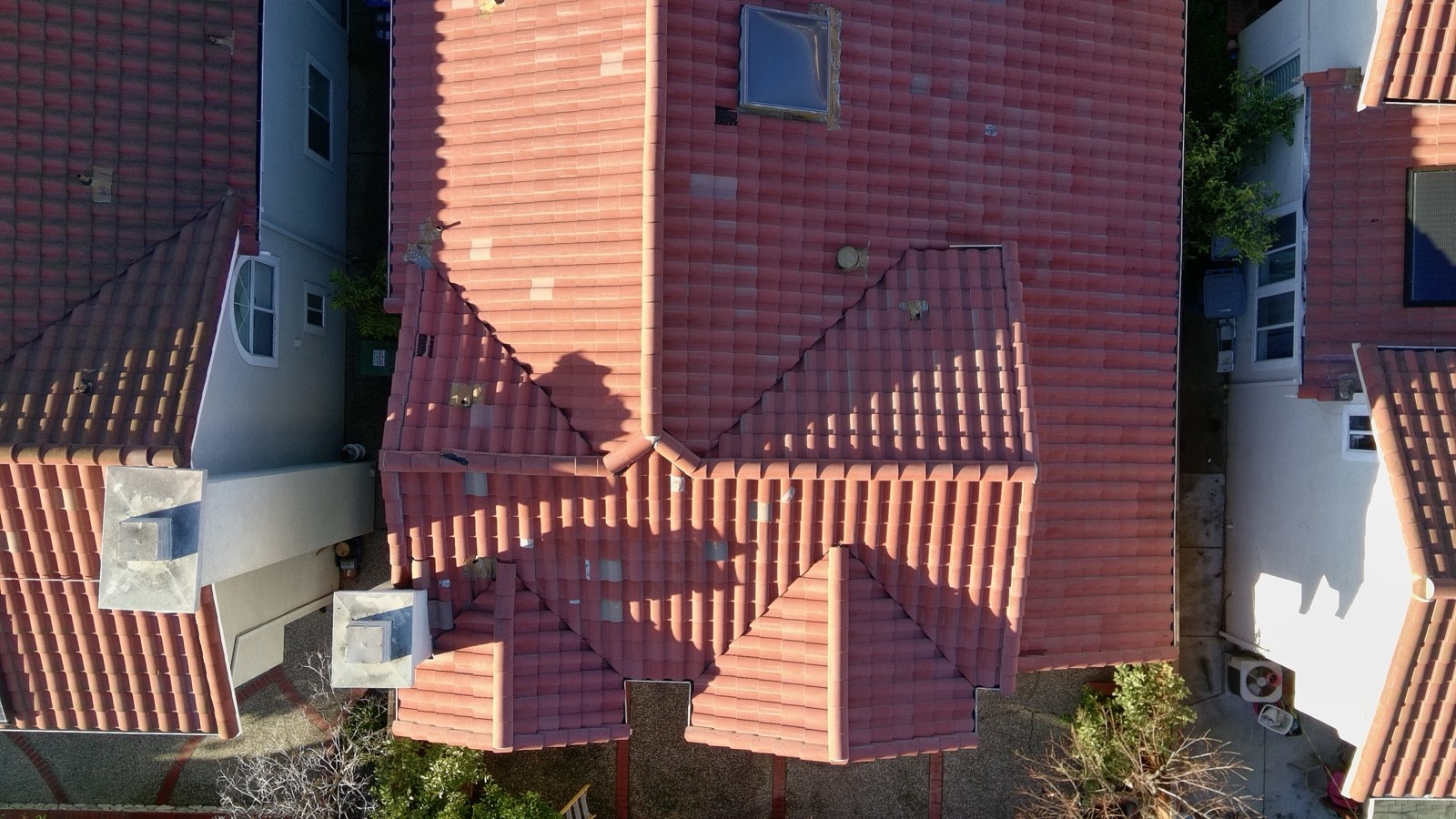 After — Milpitas townhouse S-tile roof after soft wash, moss cleared