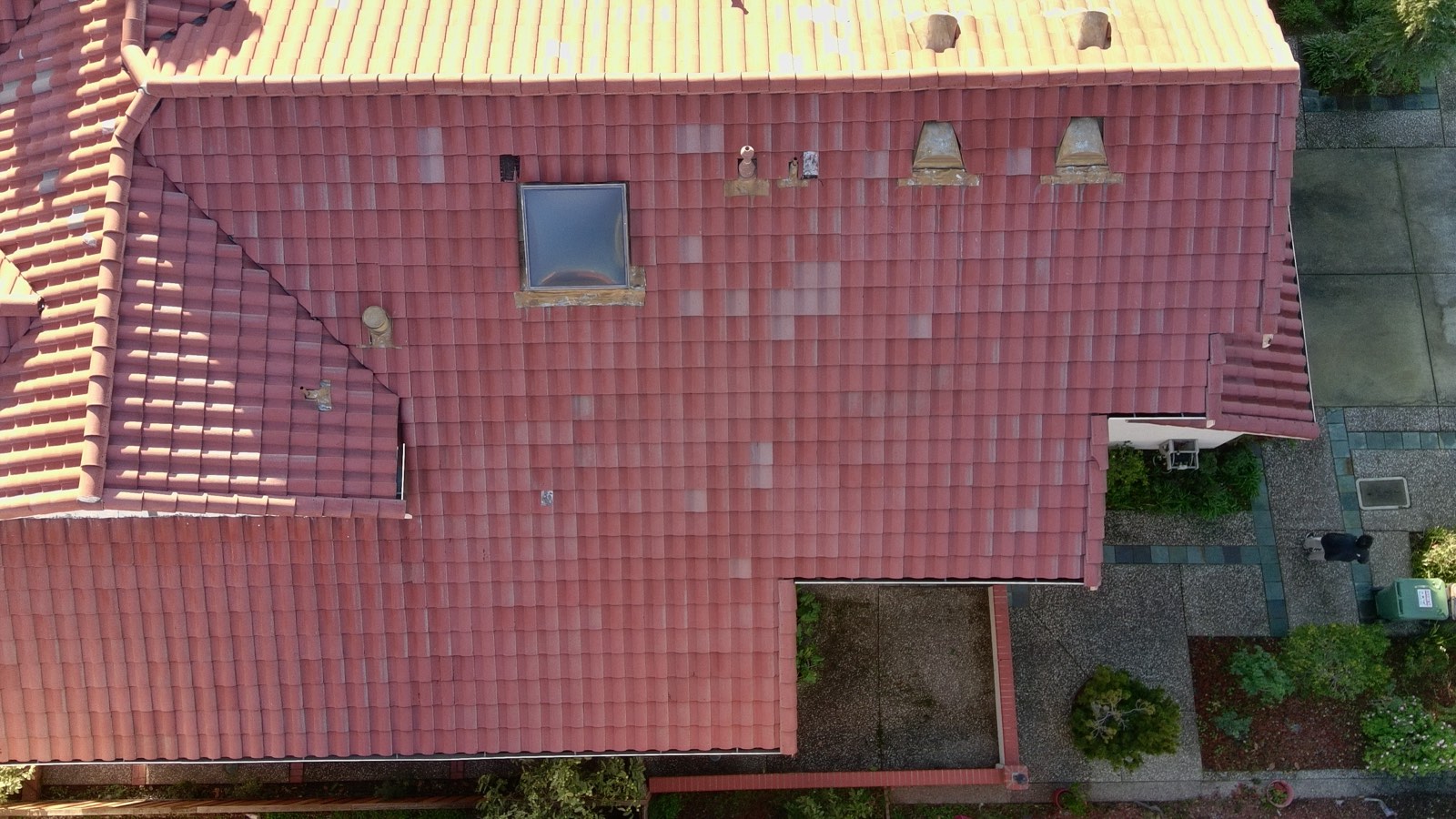 After — Wide view Milpitas townhouse S-tile roof fully cleaned and treated