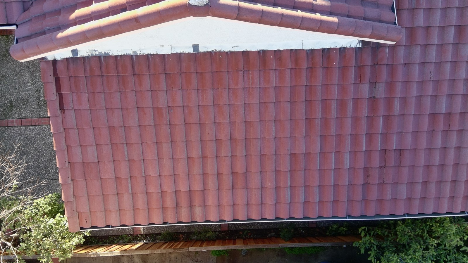 After — Milpitas townhouse S-tile roof final result, ridge clean, algae eliminated