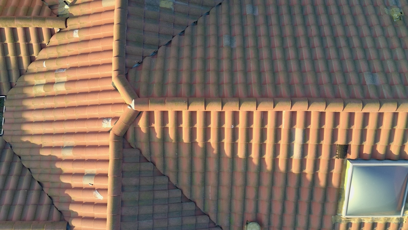 Before — Milpitas townhouse S-tile roof ridge with moss growth