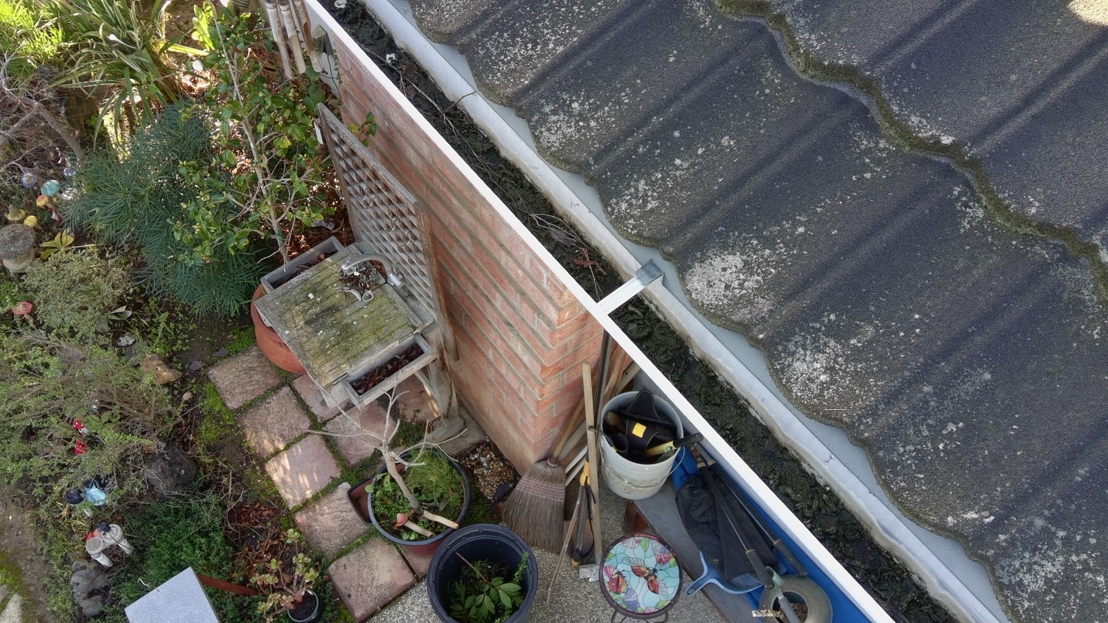 Before — Monte Sereno roof wide view showing extent of organic buildup