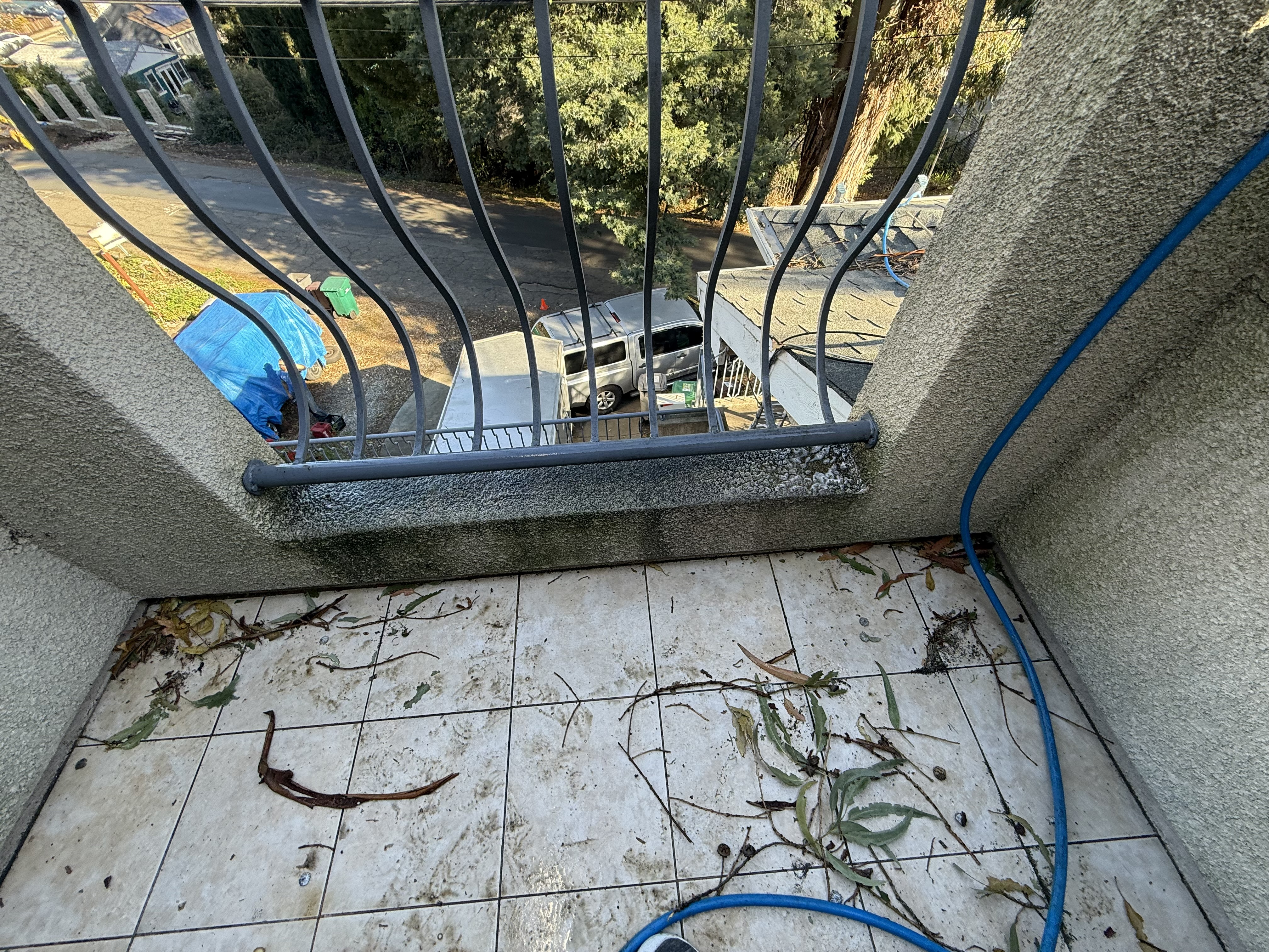 Before — Oakland Hills house showing heavy surface discoloration