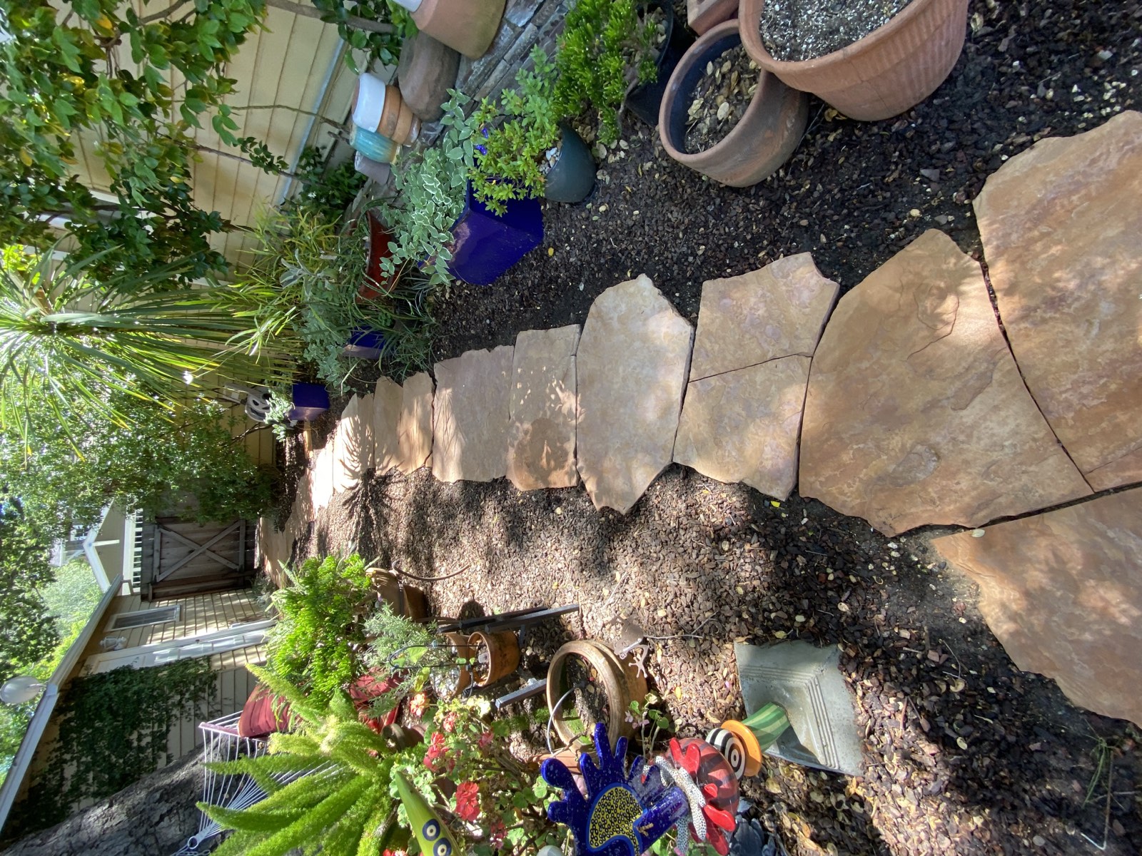 After — Palo Alto flagstone patio complete, stone color and texture clear