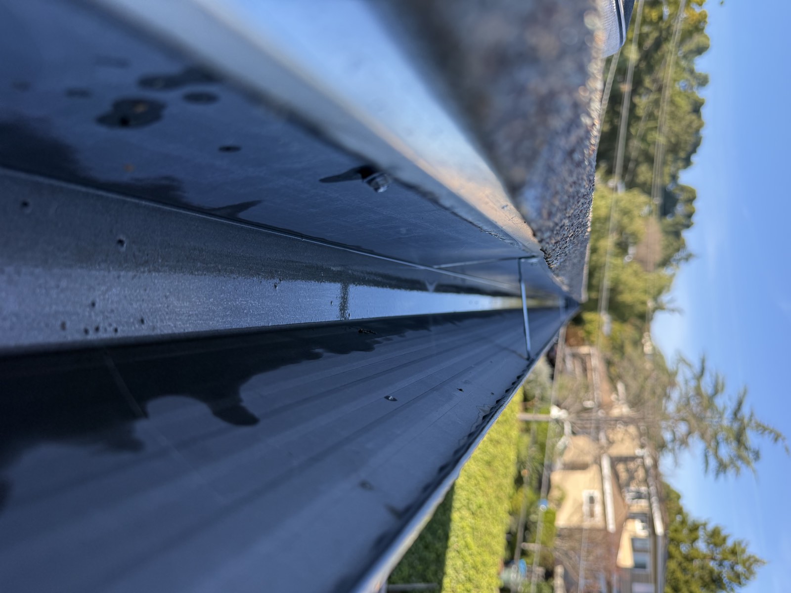 After — San Mateo gutter cleaned, trough clear along full run
