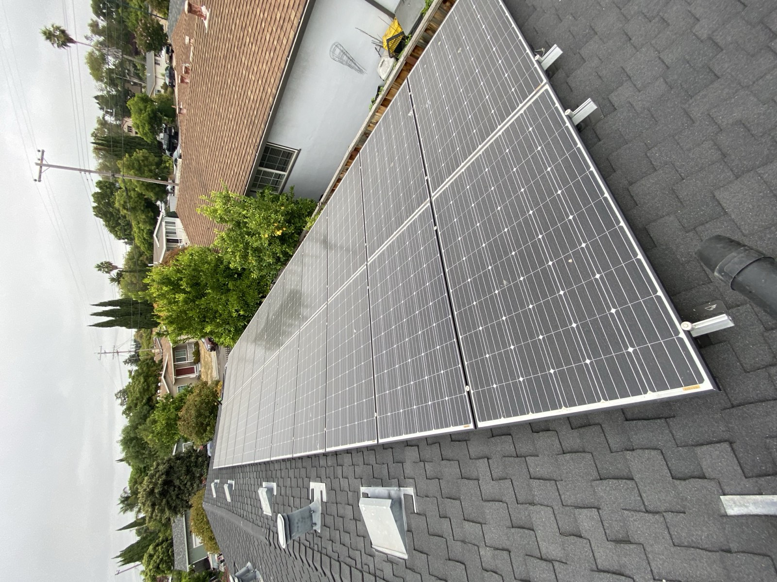 Before — Sunnyvale solar array showing bird dropping stains on panel glass